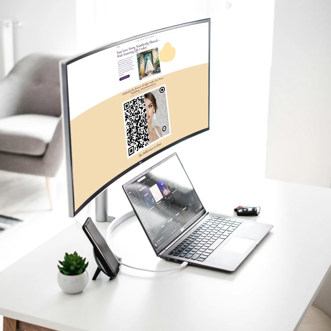 Modern workspace with a laptop and curved monitor displaying a wedding QR code website